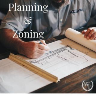 Image of person working on a building drawing, with the words Planning and Zoning