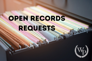 Photo of filing cabinet with the title "Open Records Requests"
