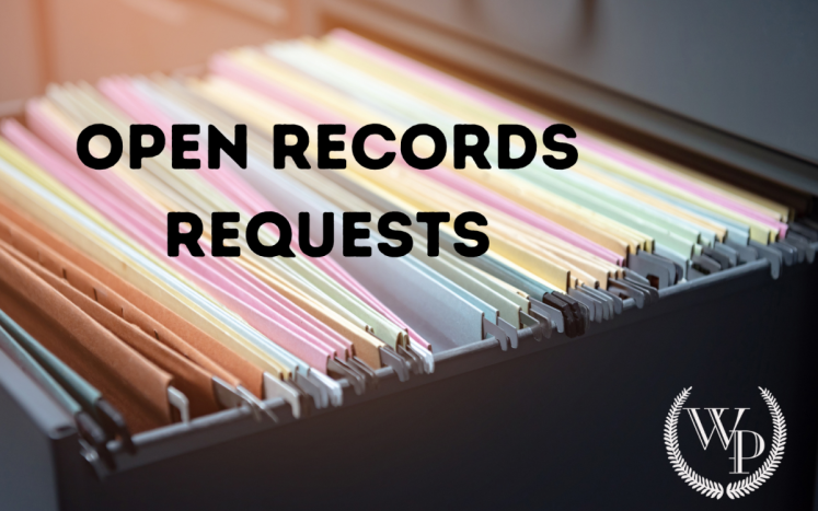 Photo of filing cabinet with the title "Open Records Requests"