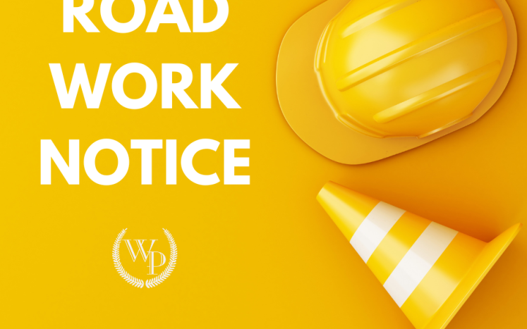 Photo of a construction hat and traffic cone with the words "road work notice"